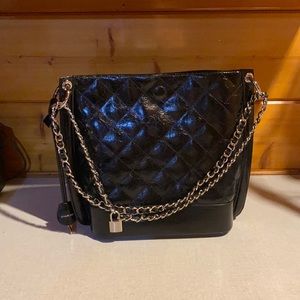 Other And quilted leather bag in black